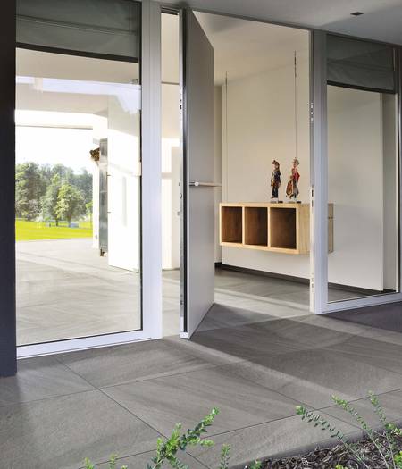Thick stoneware floor tiles with stone effect for terraces and swimming pools