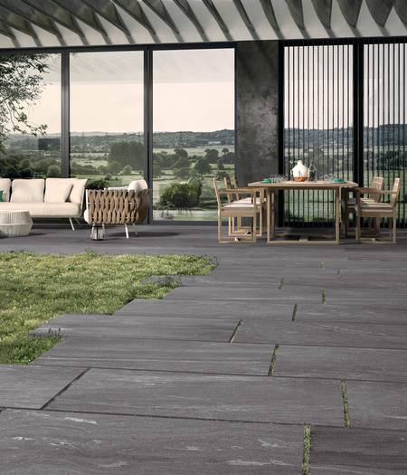 Tiles for outdoor use with resistant stone effect